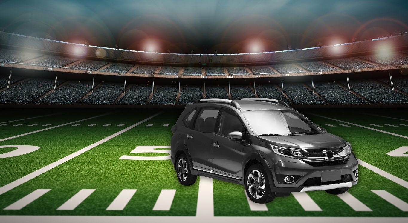 Image of car on a football field 